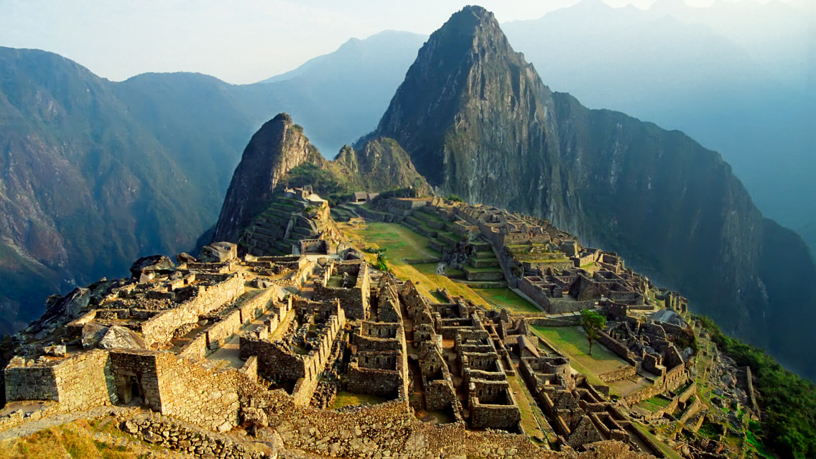 A view of the ruins of machu picchu from above.