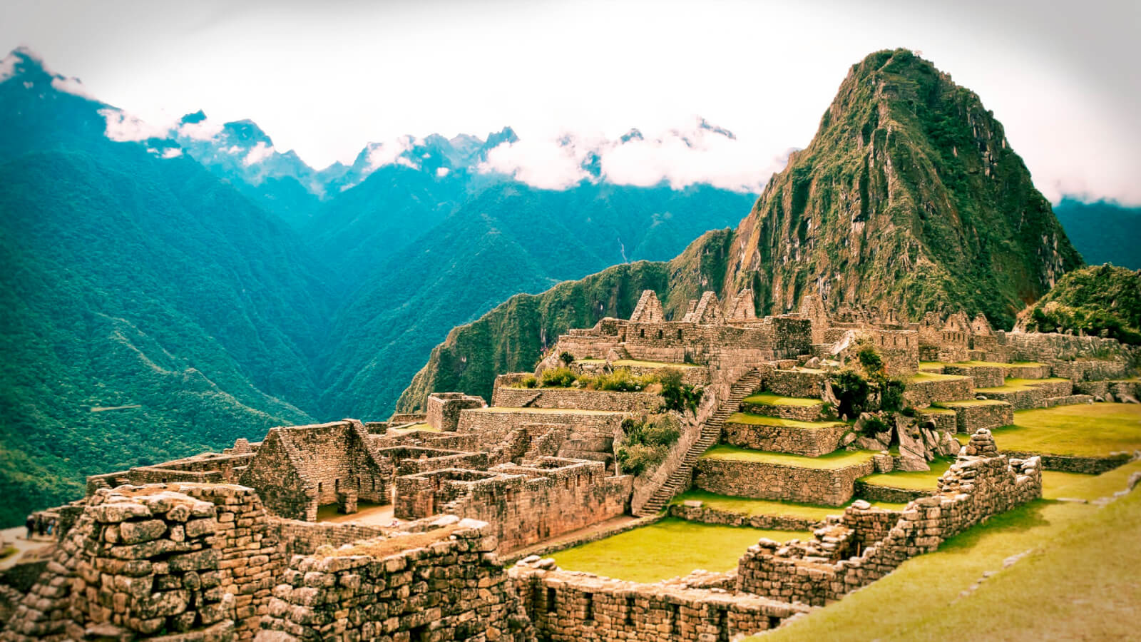 A view of the ruins of machu picchu from above.