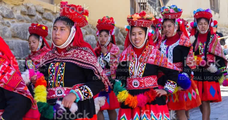 Women in colorful Andean attire.