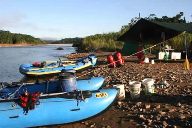 River camping with inflatable rafts.